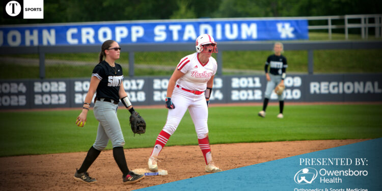 Daviess County's Kamryn Timmons celebrates her go ahead double in State Tournament win over South Warren.